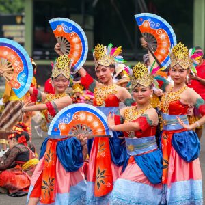Colorful traditional Indonesian dance performance at outdoor event in Cimahi, West Java.
